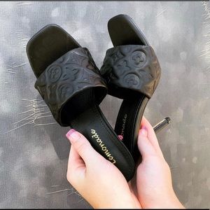Never worn boutique mules.